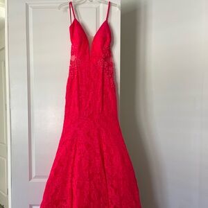 Size 6 red-orange dress. Only worn once!